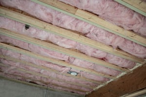 Rolls of insulation were added to the attic and basement